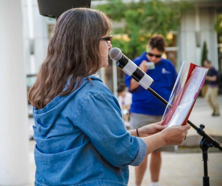 Toni in profile as Peter takes a picture by AB