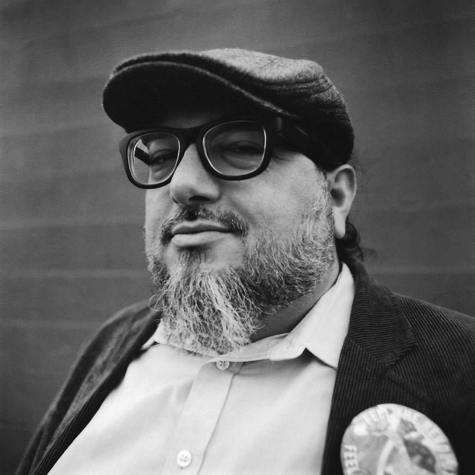 Christopher looking sideways at Julian Nelson December 2016